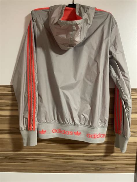 rote adidas regenjacke